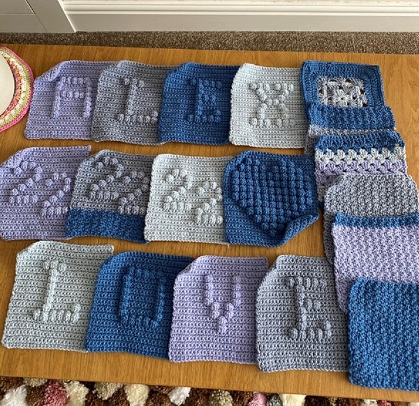 Woolly Hugs. Making a blanket for lovely Crazyladee and her family. We need help.