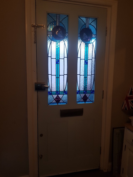 Repair or replace our front door??