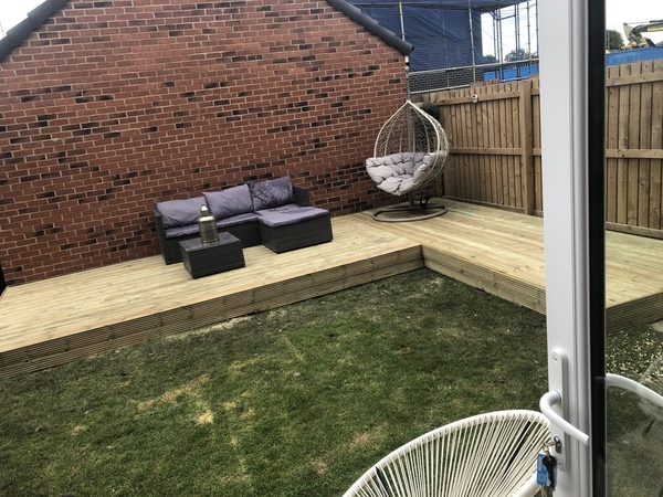 (Picture attached)Fell out with neighbours over a garage wall. Help!!