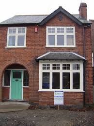 How can I spruce up the exterior of my unlovely 30s house
