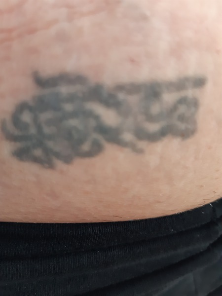 Chinese (we think, but could be Japanese) symbol help.