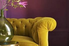I'm buying the sofa. Help me find a paint colour.