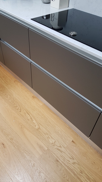 What flooring with grey cabinets in kitchen?