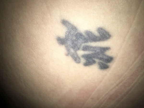 Chinese (we think, but could be Japanese) symbol help.