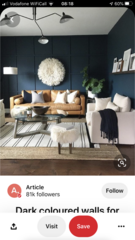 stuck with horrible black sofas and don't know how to redecorate room around it