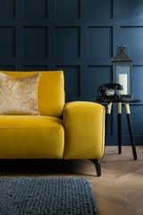 I'm buying the sofa. Help me find a paint colour.
