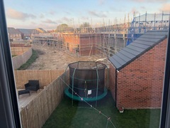 (Picture attached)Fell out with neighbours over a garage wall. Help!!