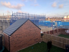 (Picture attached)Fell out with neighbours over a garage wall. Help!!