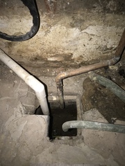 Open drain under boiler