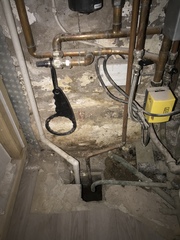 Open drain under boiler
