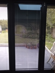 Bifold integrated blinds
