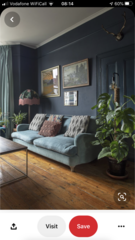 stuck with horrible black sofas and don't know how to redecorate room around it