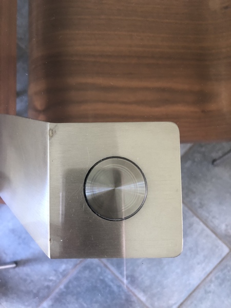 Help! How to remove the glass top from this table