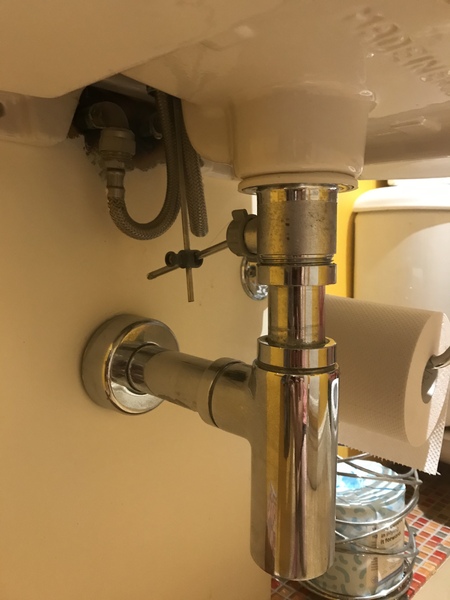I need to undo these pipes under the sink