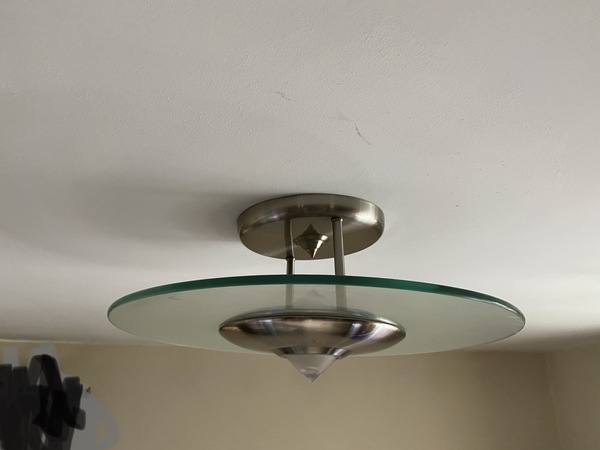 Does anyone have this ceiling light? Can’t change bulb!