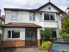 How can I spruce up the exterior of my unlovely 30s house
