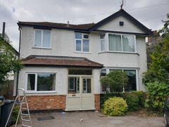 How can I spruce up the exterior of my unlovely 30s house