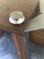 Help! How to remove the glass top from this table