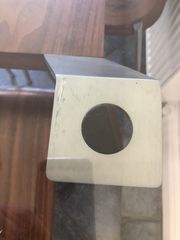 Help! How to remove the glass top from this table