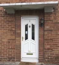I painted my (shit UPVC) front door magenta today