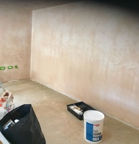 Garage Conversion smells musty when it rains - please help me figure out the cause?!