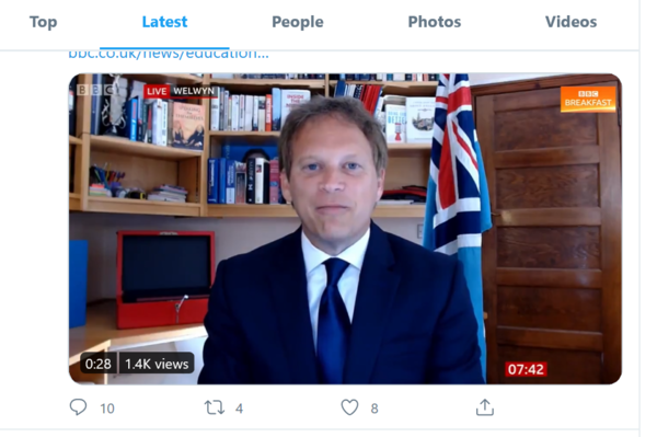 Grant Shapp's bookshelf and 'Zoom' background