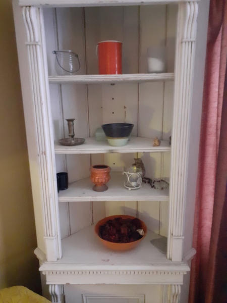 How can I make this corner cabinet look better?