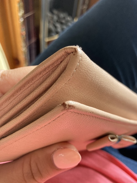 Aibu to expect a refund for (suspected) unauthentic does get purse?