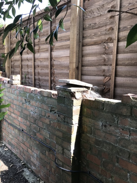 Neighbours old wall and new fence - are they taking the piss?