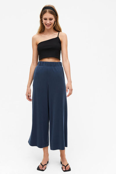 Something like lounge trousers but wearable outside?
