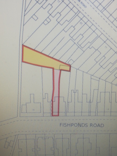 How do I find out who owns this random bit of land?