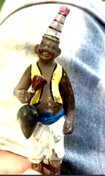 To ask for help identifying this tiny man