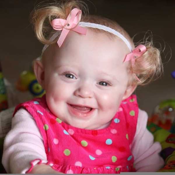 Headbands and Bows on bald baby heads,