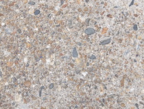 Does the patio surface/rockery wall exist today?