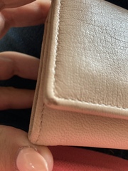Aibu to expect a refund for (suspected) unauthentic does get purse?