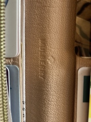 Aibu to expect a refund for (suspected) unauthentic does get purse?