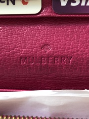 Aibu to expect a refund for (suspected) unauthentic does get purse?