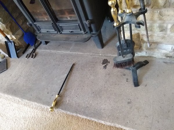 Stained stone hearth