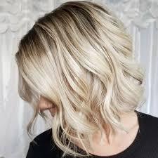 Bleach blonde with root shadow