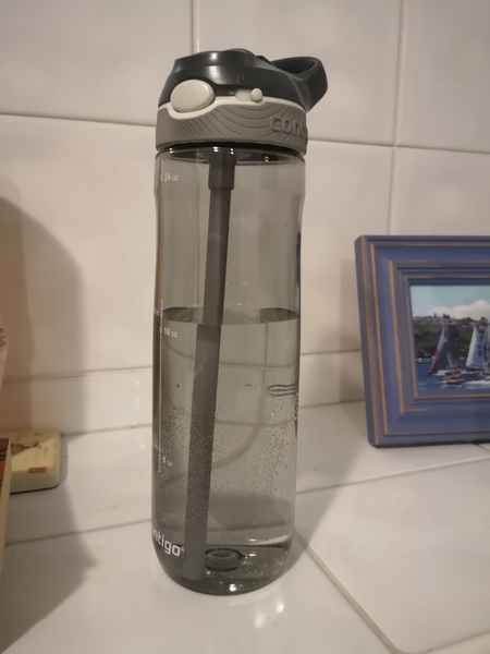 Adult drinking bottle with straw.  Am I the only one without enough suck?