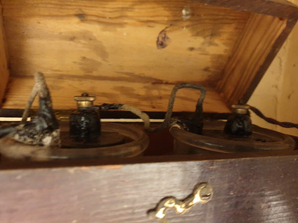 What is this wooden box with wires?
