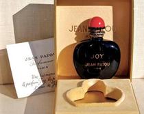 Name that perfume! Red and black bottle from the 80's/90's