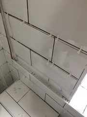 To not pay tiler until he’s fixed a botched job?