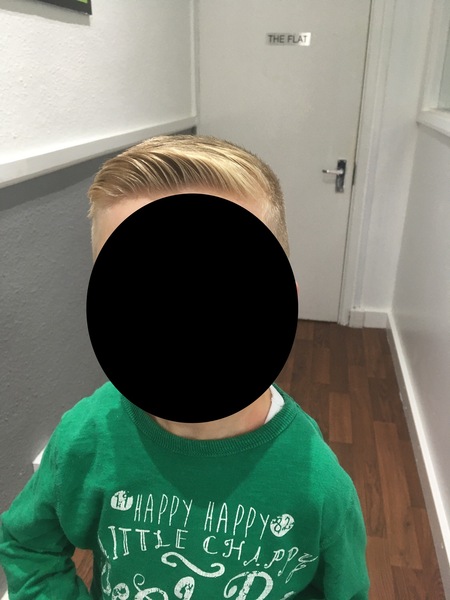 How does your primary aged boy have his hair cut?