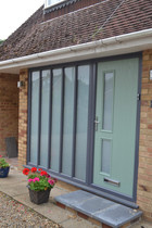 Grey window frames, coloured front door?