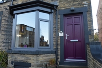 Grey window frames, coloured front door?