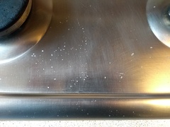 Help stainless steel cooker hob damage