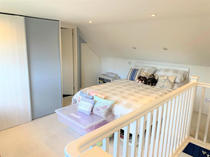 Staircase within bedroom