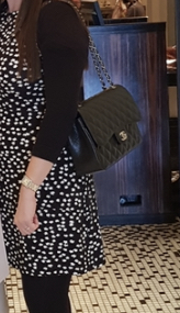 Black cross body bag budget £1000. Gucci Marmont?