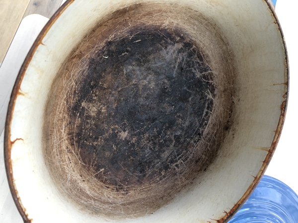 Le Creuset pot is very old, gone a bit rusty, and now badly scratched the hob - what affordable replacement can I buy?
